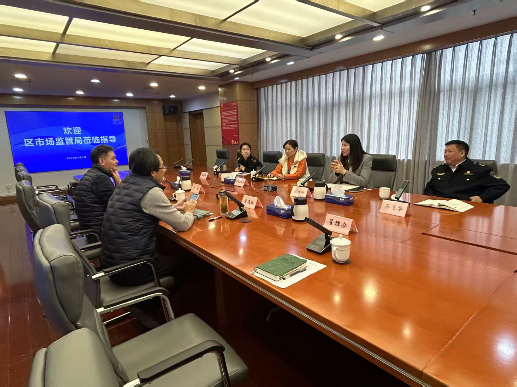 区市场监管局陈佳琳副局长带队先后赴真如镇街道和真如市场所开展座谈交流